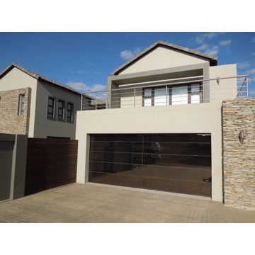 Garage door double frameless glass bronze