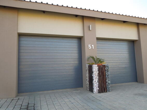 Garage door Chromadeck steel single charcoal slat W2440mm x H2135mm