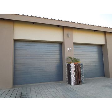 Garage door Chromadeck steel single charcoal slat W2440mm x H2135mm