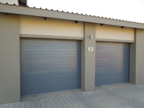 Garage door Chromadeck steel single charcoal slatted  W2440mm x H2135mm