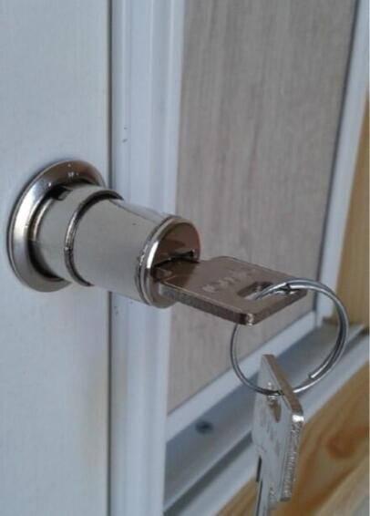 Wardrobe sliding door push lock
